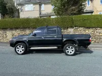 Käytetty Mitsubishi L200 Warrior 113 HP (83 kW) 2003 Musta Nouto