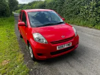 Used Daihatsu Sirion 69 HP (50 kW) 2008 Red Hatchback