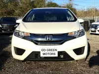 Used Honda Fit Hybrid 137 HP (100 kW) 2014 White Hatchback