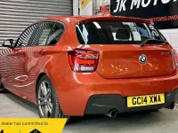 Used BMW M135 M Performance 320 HP (235 kW) 2014 Orange Hatchback