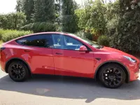 Used Tesla Model Y Long Range AWD 378 kW (514 HP) 2022 Red SUV