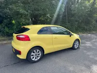 Used Kia Rio 84 HP (61 kW) 2016 Yellow Hatchback