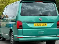 Used VW Caravelle Executive 199 HP (146 kW) 2020 Green Van