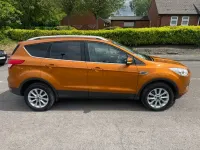 Używany Ford Kuga Titanium 180 KM (132 kW) 2015 Pomarańczowy SUV