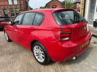 Usado BMW 118 Comfort Edition 170 CV (125 kW) 2013 Rojo Utilitario