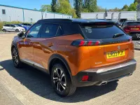 Second-hand Peugeot 2008 GT 129 CP (94 kW) 2023 Portocaliu SUV