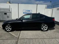 Second-hand BMW 318 Performance 143 CP (105 kW) 2012 Negru Berlinǎ