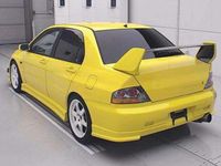 Used Mitsubishi Lancer 276 HP (202 kW) 2003 Yellow Sedan