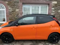 Second-hand Toyota Aygo X-cite 72 CP (52 kW) 2020 Portocaliu Hatchback