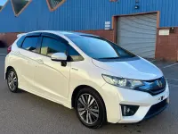 Used Honda Fit Hybrid 137 HP (100 kW) 2015 White Hatchback