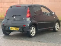 Używany Peugeot 107 Allure 68 KM (50 kW) 2013 Czarny Hatchback