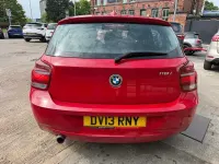 Usado BMW 118 Comfort Edition 170 CV (125 kW) 2013 Rojo Utilitario
