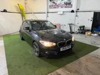 Używany BMW 118 Sport Line 150 KM (110 kW) 2016 Czarny Hatchback