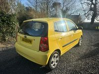 Used Kia Picanto 64 HP (47 kW) 2010 Yellow Hatchback