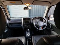 Used Suzuki Jimny SZ4 85 HP (62 kW) 2015 Black and grey SUV