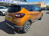 Used Renault Captur Dynamique 90 HP (66 kW) 2018 Orange/black SUV