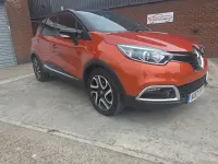 Used Renault Captur Dynamique 90 HP (66 kW) 2017 Orange/black SUV
