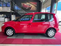 Used Skoda Roomster Drive 70 HP (51 kW) 2009 Red MPV