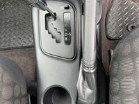 Used Toyota iQ 68 HP (50 kW) 2010 Silver Hatchback