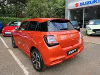 Used Suzuki Swift 82 HP (60 kW) 2026 Flame orange pearl metallic Hatchback