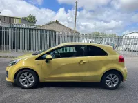 Used Kia Rio 84 HP (61 kW) 2016 Yellow Hatchback