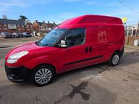 Używany Fiat Doblò 105 KM (77 kW) 2013 Czerwony Minivan