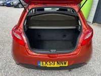 Usado Mazda 2 75 HP (55 kW) 2009 Laranja Citadino