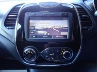 Used Renault Captur Dynamique 90 HP (66 kW) 2015 Orange black SUV