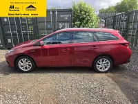 Used Toyota Auris Hybrid 136 HP (100 kW) 2018 Red Estate