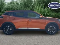 Used Peugeot e-2008 Allure 100 kW (136 HP) 2021 Orange SUV