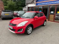 Used Suzuki Swift SZ4 90 HP (66 kW) 2014 Red Hatchback