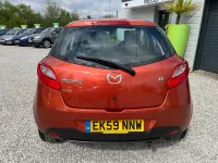 Usado Mazda 2 75 HP (55 kW) 2009 Laranja Citadino