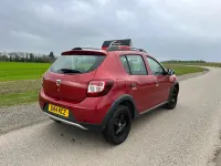 Używany Dacia Sandero Lauréate 88 KM (64 kW) 2014 Czerwony Hatchback
