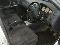 Begagnad Mazda 323 2002 Halvkombi