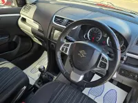 Usado Suzuki Swift SZ-L 94 HP (69 kW) 2016 Vermelho Citadino