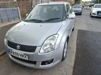 Usado Suzuki Swift GLX 101 HP (74 kW) 2009 Prateado Citadino