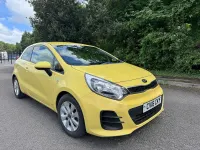 Used Kia Rio 84 HP (61 kW) 2016 Yellow Hatchback