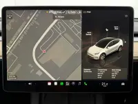 Used Tesla Model Y Standard Range 219 kW (299 HP) 2024 White SUV