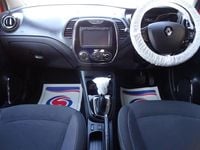 Used Renault Captur Dynamique 90 HP (66 kW) 2015 Orange black SUV