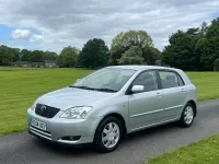Used Toyota Corolla 97 HP (71 kW) 2004 Silver Hatchback