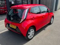 Used Toyota Aygo x-press 68 HP (50 kW) 2014 Red Hatchback