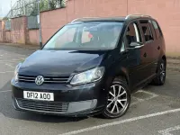 Używany VW Touran SE 105 KM (77 kW) 2012 Czarny Minivan