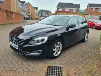Usado Volvo V60 SE Lux 181 HP (133 kW) 2014 Preto Carrinha