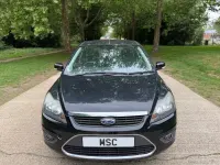 Używany Ford Focus Titanium 100 KM (73 kW) 2010 Czarny Hatchback