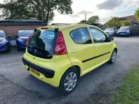 Used Peugeot 107 68 HP (50 kW) 2010 Yellow Hatchback