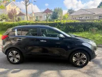 Usado Kia Sportage 115 HP (84 kW) 2014 Preto SUV