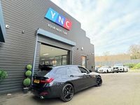Used BMW 330e Sport Line 288 HP (211 kW) 2023 Black Estate