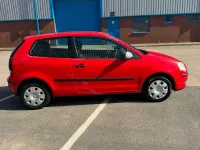 Begagnad VW Polo 2009 Röd Halvkombi