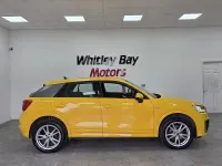 Used Audi Q2 S-Line 116 HP (85 kW) 2019 Yellow SUV