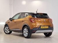 Second-hand Renault Captur Iconic 100 CP (73 kW) 2020 Portocaliu SUV
